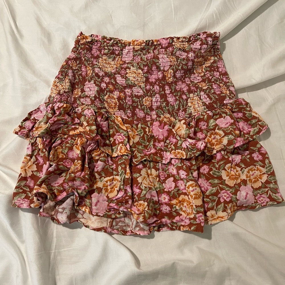 Mauve floral skirt sm/med. Stretchy waist band. Worn twice. Layered with ruffles